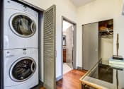 Thumbnail 20 of 51 - Hallway with Washer and Dryer  at Equinox Apartments, Seattle